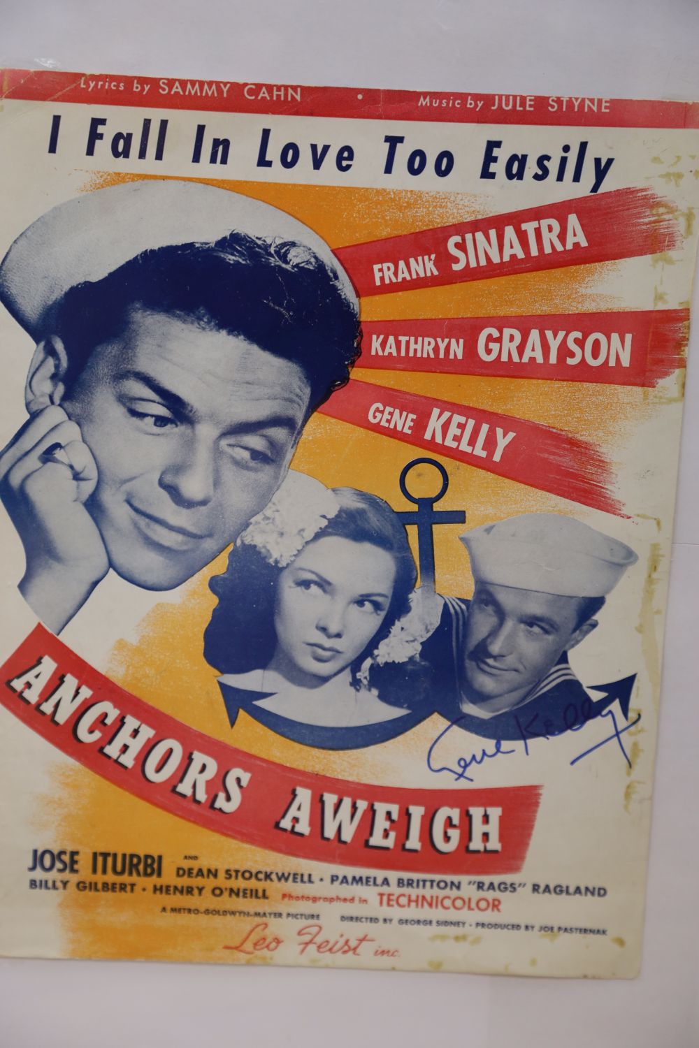 An Anchors Aweigh, poster, signed by Gene Kelly, 31 x 24cm